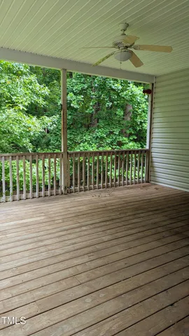 a view of a balcony with a chairs