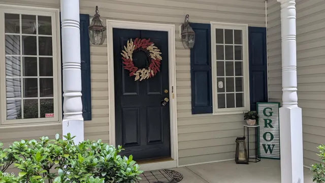 a front view of a house with a garage