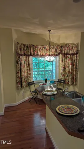 a table and chairs in a patio