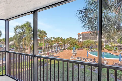 a sign that is in front of flowers