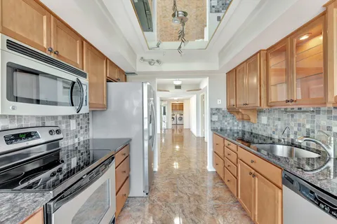 a view of a storage & utility room with washer and dryer