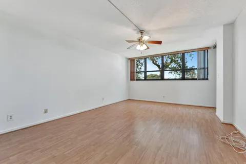 a bathroom with a toilet sink and a shower