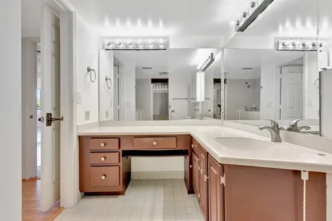 a view of a porch with a floor to ceiling window