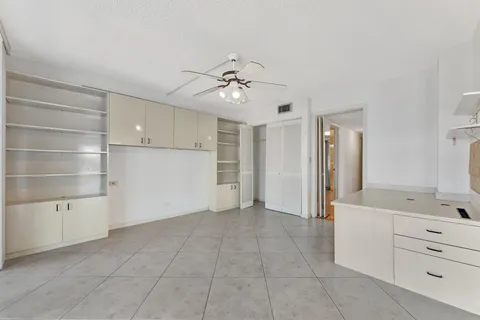 a view of a bathroom with a tub and windows