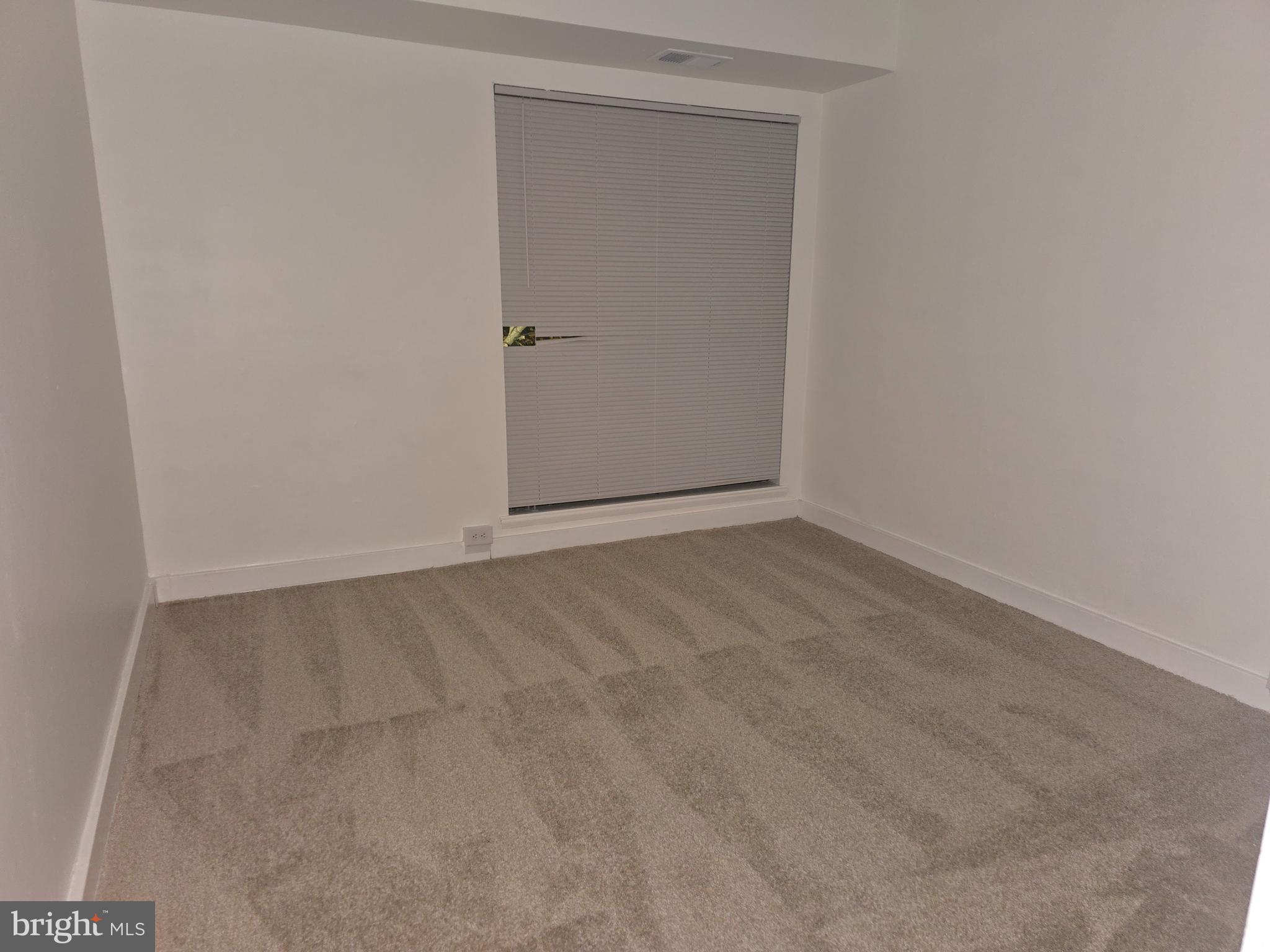 5901 Tamar Drive, Unit 10 S10 Columbia, MD 21045 - Photo 17 of 27 a view of an empty room