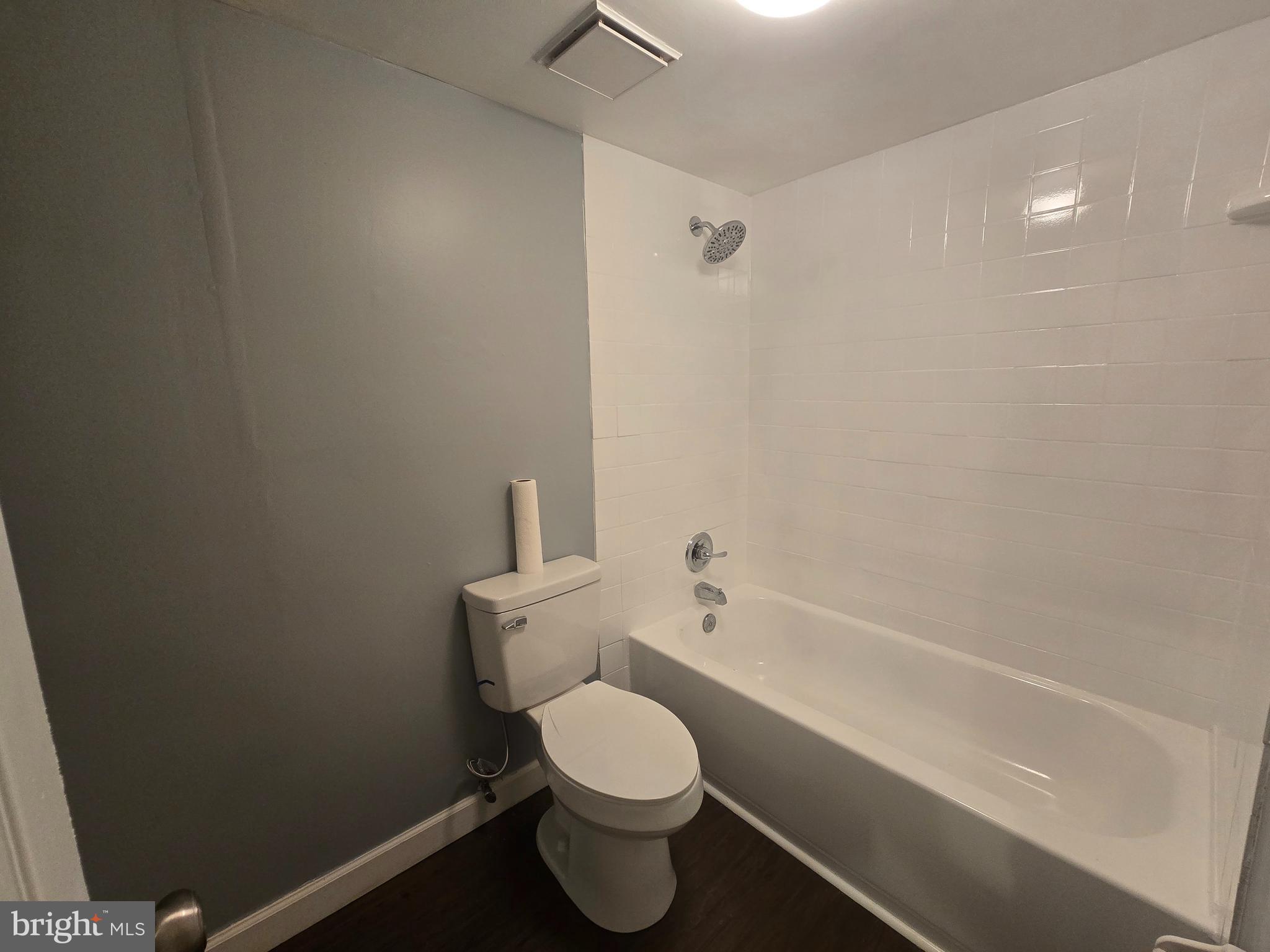 5901 Tamar Drive, Unit 10 S10 Columbia, MD 21045 - Photo 18 of 27 a bathroom with a toilet and a shower