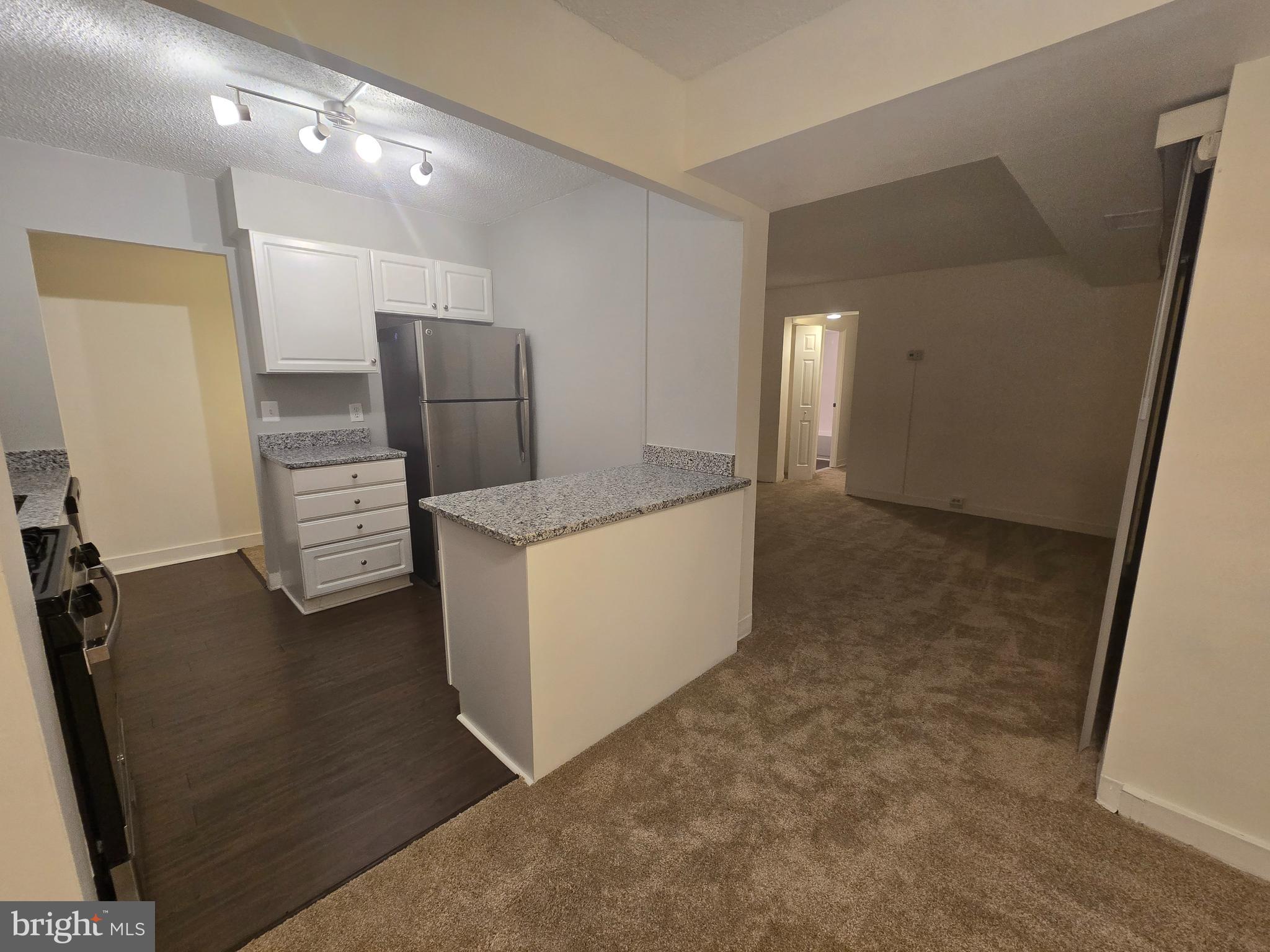 5901 Tamar Drive, Unit 10 S10 Columbia, MD 21045 - Photo 23 of 27 walk in closet with view of bathroom