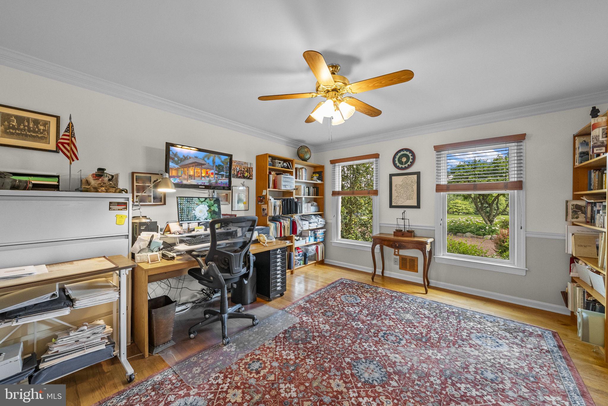 125 Mine Road Pennington, NJ 08534 - Photo 12 of 36 a view of a workspace with furniture and a window