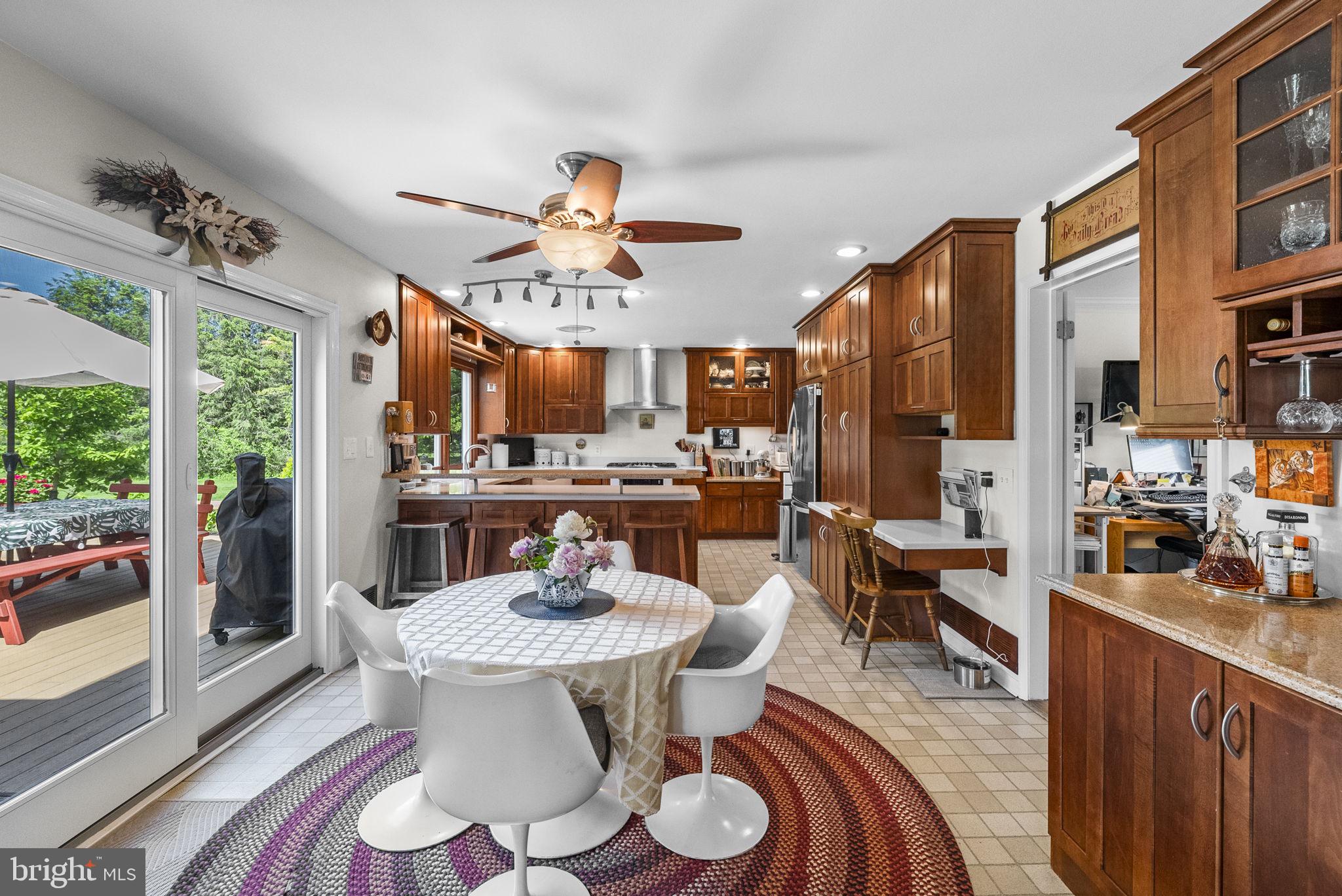 125 Mine Road Pennington, NJ 08534 - Photo 13 of 36 a view of a dining room with furniture window and wooden floor