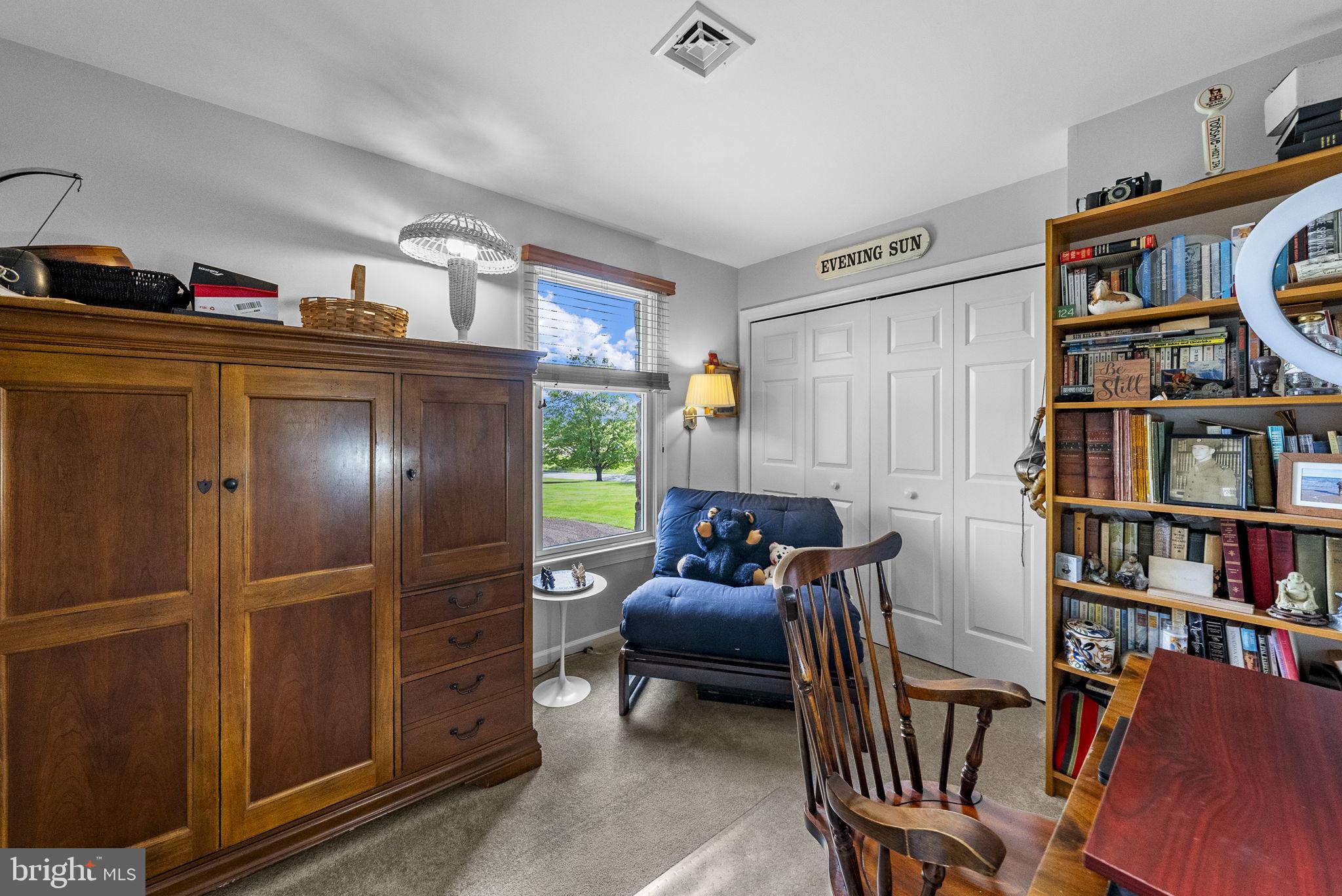 125 Mine Road Pennington, NJ 08534 - Photo 17 of 36 a living room with furniture cabinets and a window