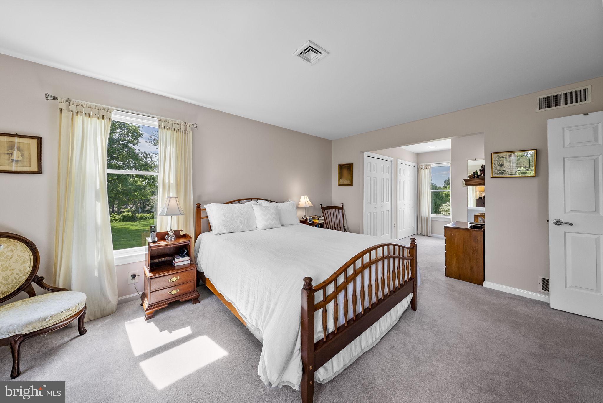 125 Mine Road Pennington, NJ 08534 - Photo 23 of 36 a bed room with a bed and a chair