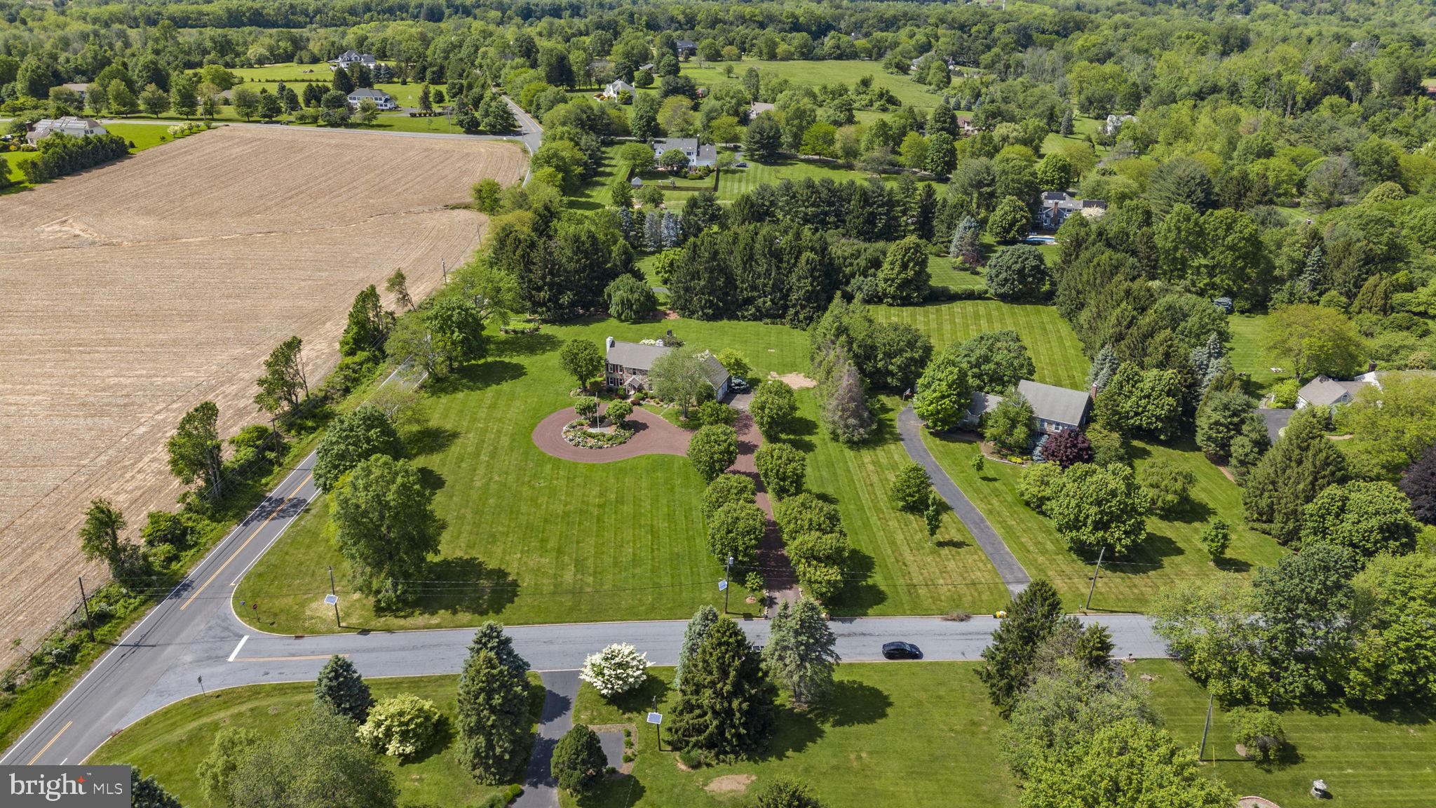 125 Mine Road Pennington, NJ 08534 - Photo 3 of 36 an aerial view of a house with a yard