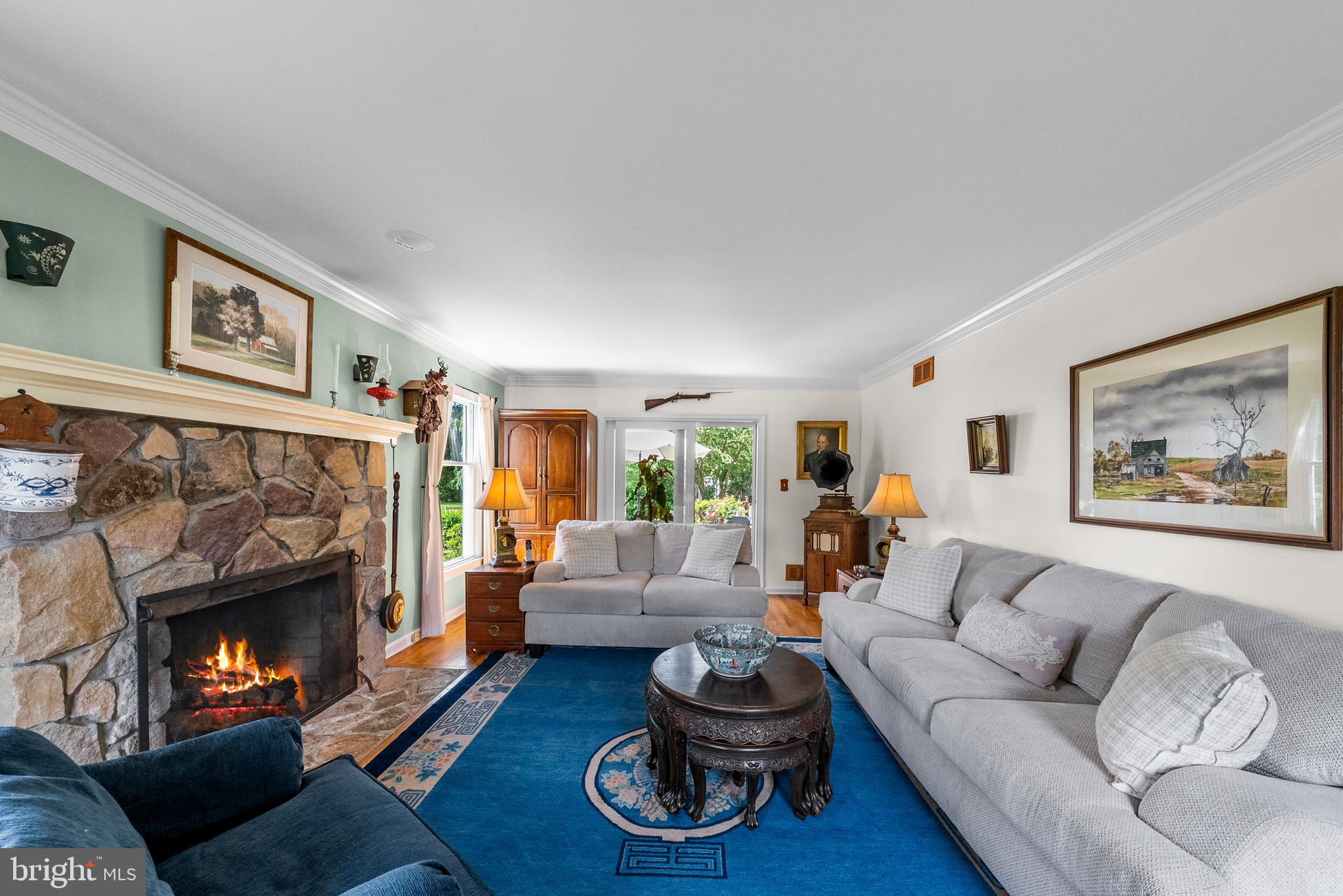 125 Mine Road Pennington, NJ 08534 - Photo 9 of 36 a living room with furniture and a fireplace