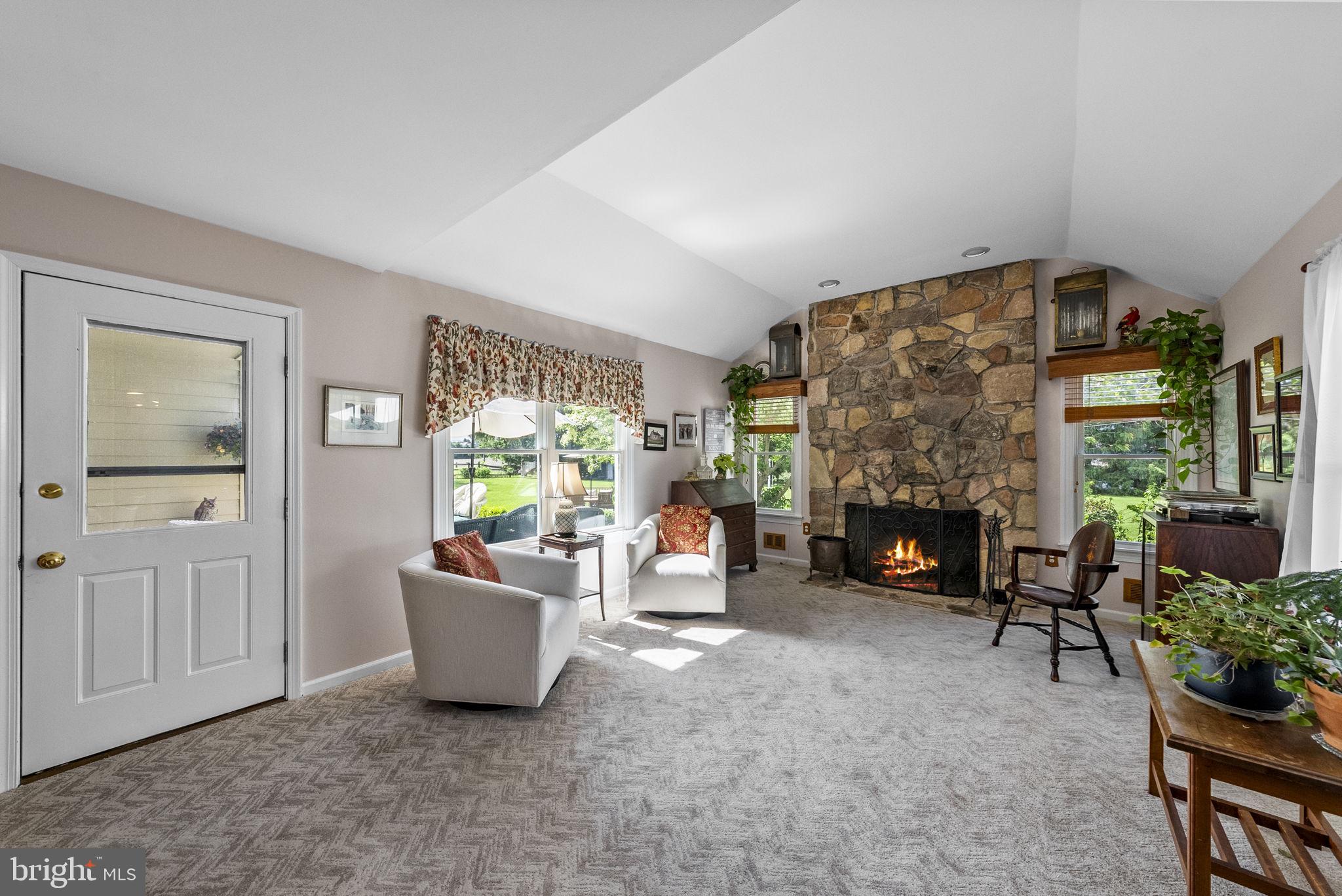 125 Mine Road Pennington, NJ 08534 - Photo 10 of 36 a living room with furniture and a fireplace