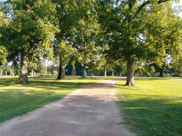 a view of swimming pool with an outdoor space and seating area