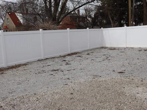 a view of a yard covered with snow