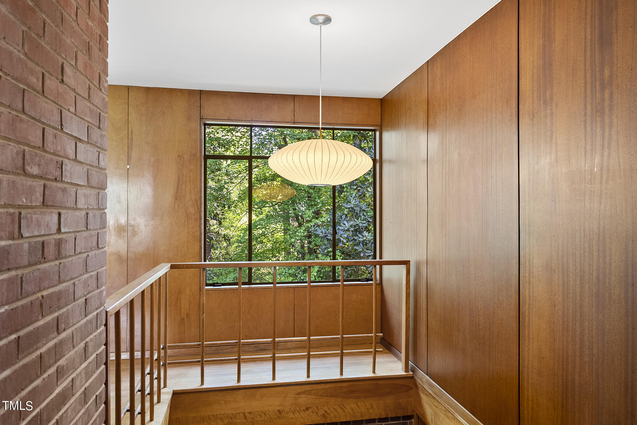 2715 Rosedale Avenue Raleigh, NC 27607 - Photo 3 of 46 a Nelson pendant graces with stairwell and greets visitors to this wonderfully intact Mid Century Mod home