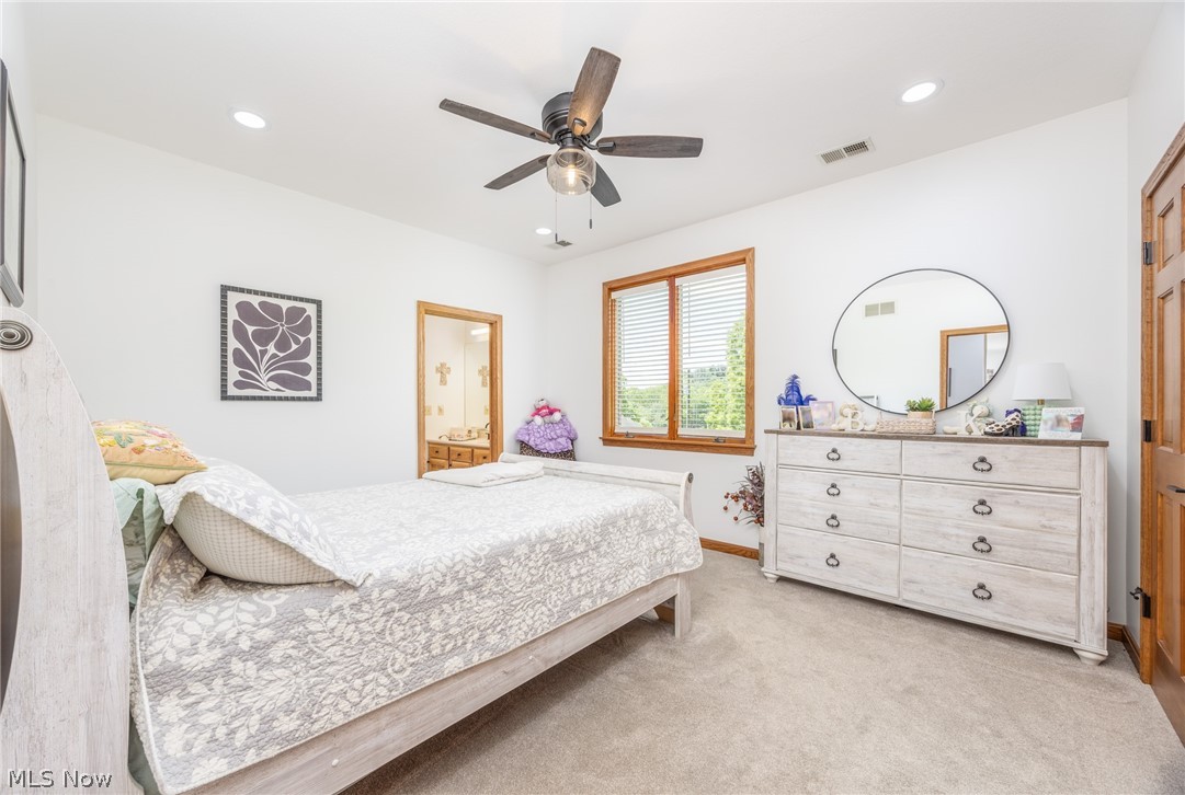1602 Glendale Road, Unit 3 Marietta, OH 45750 - Photo 30 of 49 Carpeted room featuring a ceiling fan with integrated lighting, recessed lighting, and a wood-framed window with blinds