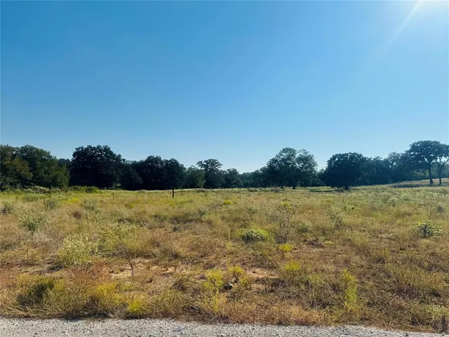 a view of an ocean and sunset