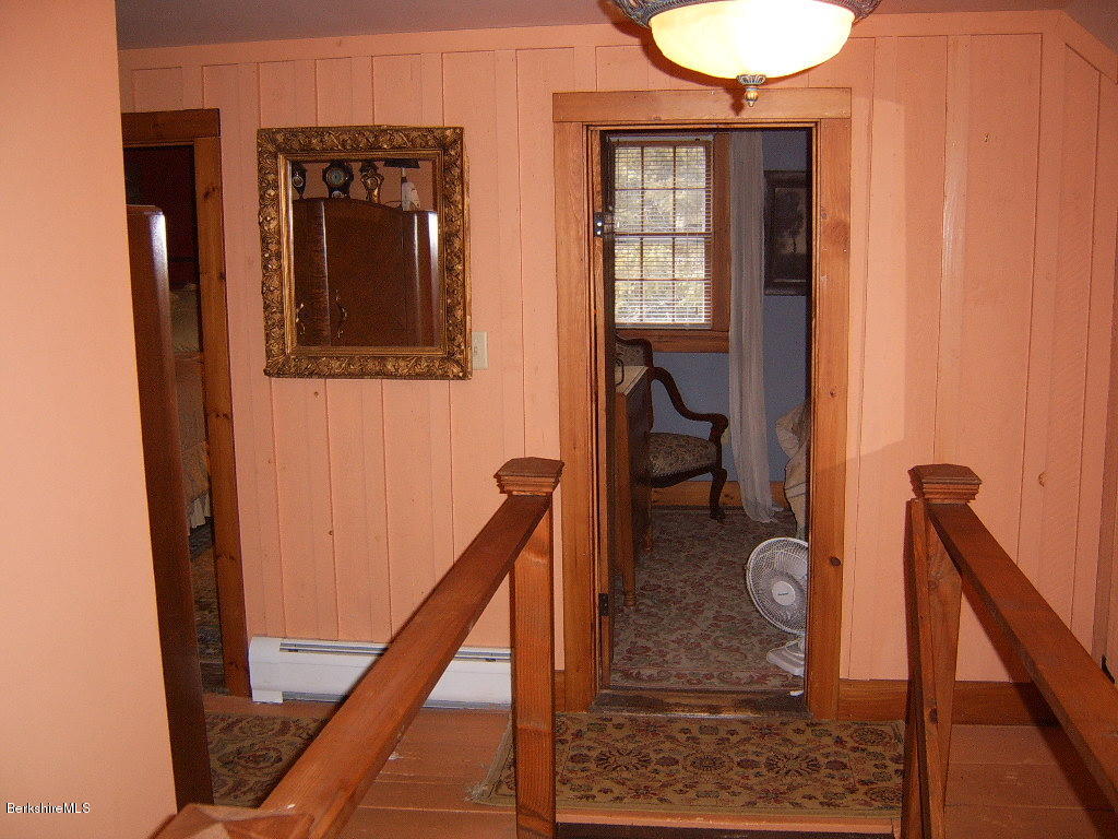 1191 George Carter Road Becket, MA 01223 - Photo 14 of 38 a view of a hallway with staircase