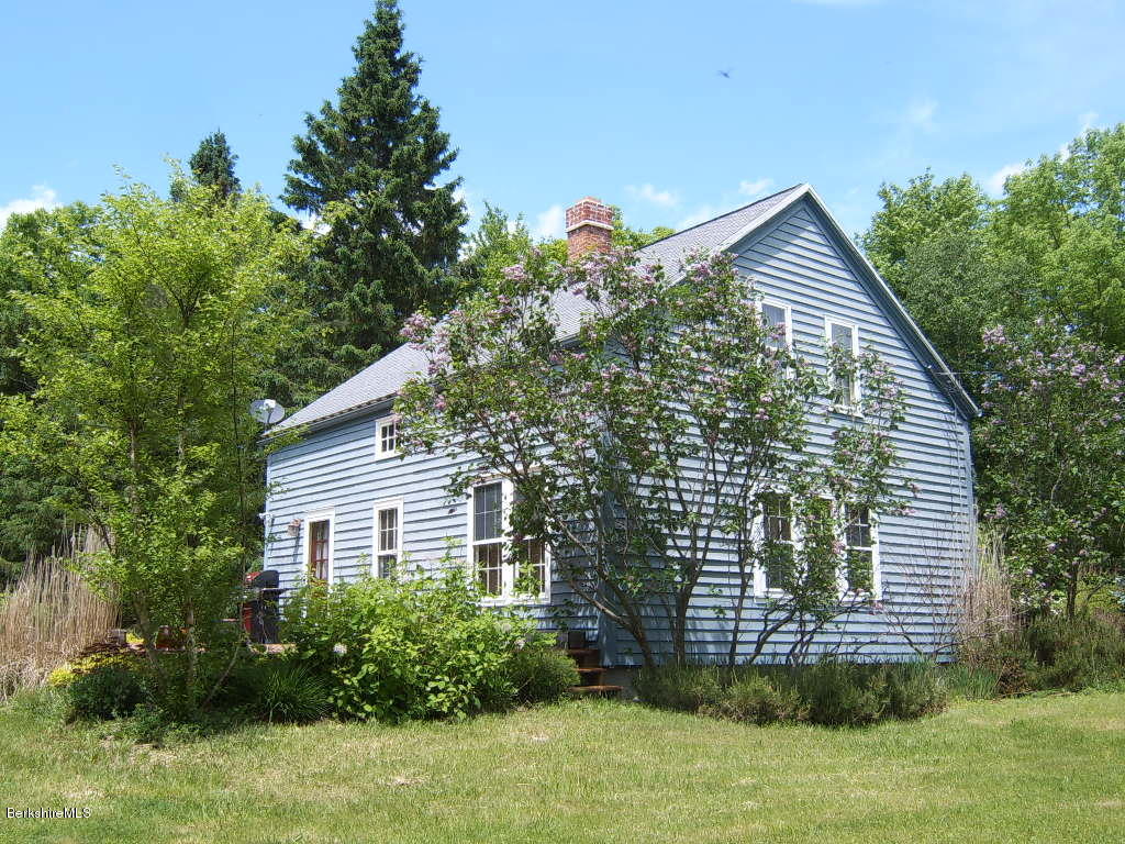 1191 George Carter Road Becket, MA 01223 - Photo 3 of 38 a view of a house with a yard