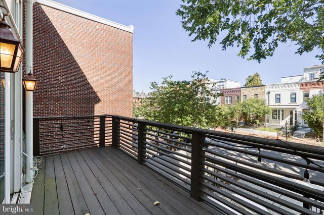 a view of city from a balcony