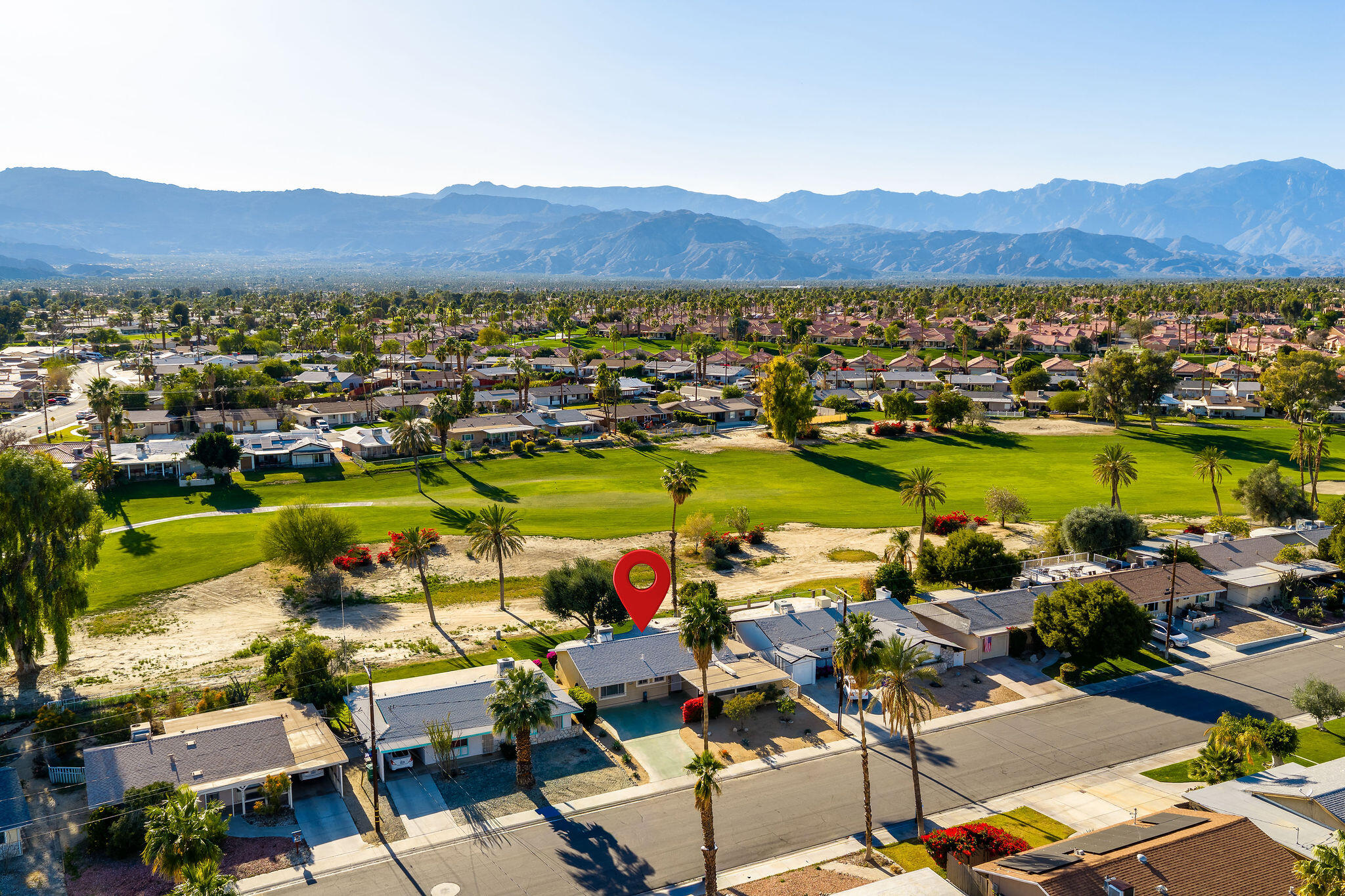 42735 Kansas Street Palm Desert, CA 92211 - Photo 42 of 48 a view of a city with lake view