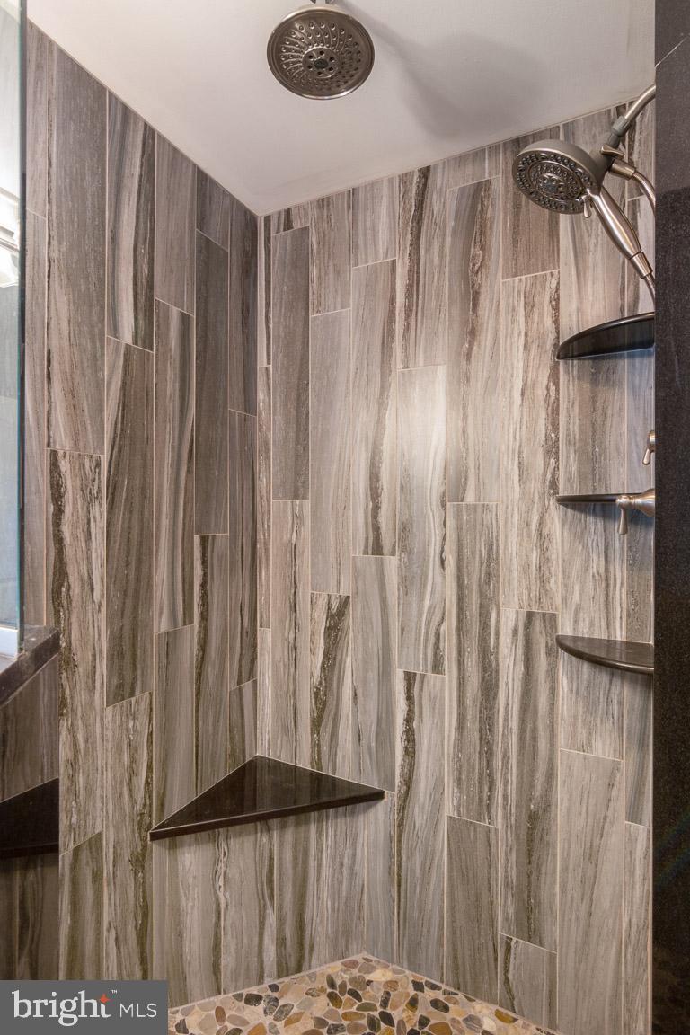 8238 New Cut Road Severn, MD 21144 - Photo 25 of 41 Close up of tile in master shower