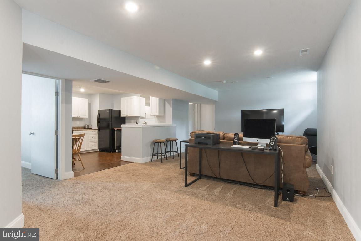 8238 New Cut Road Severn, MD 21144 - Photo 34 of 41 Apt: Long View of Living room and Kitchen Ap