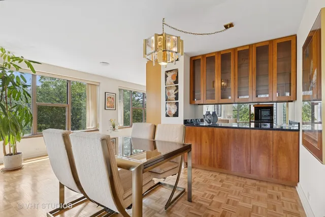 a view of a dining room with furniture window and outside view