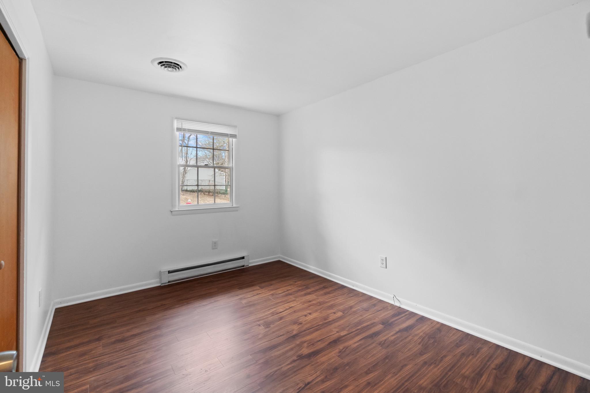 981 Westway Annapolis, MD 21409 - Photo 12 of 38 an empty room with wooden floor and windows