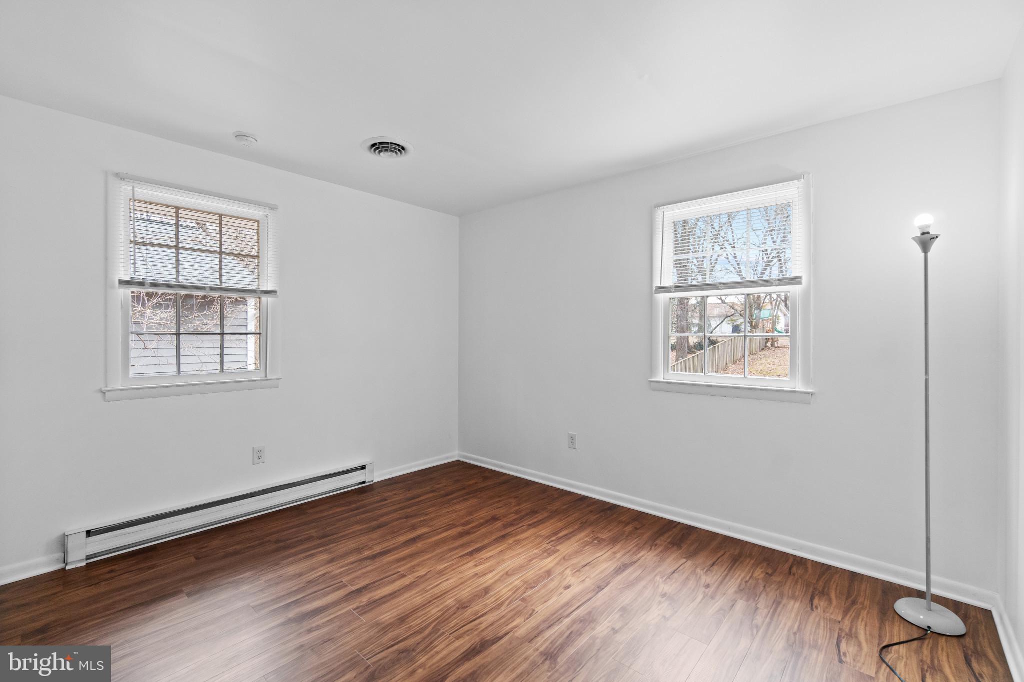 981 Westway Annapolis, MD 21409 - Photo 16 of 38 wooden floor in an empty room with a window