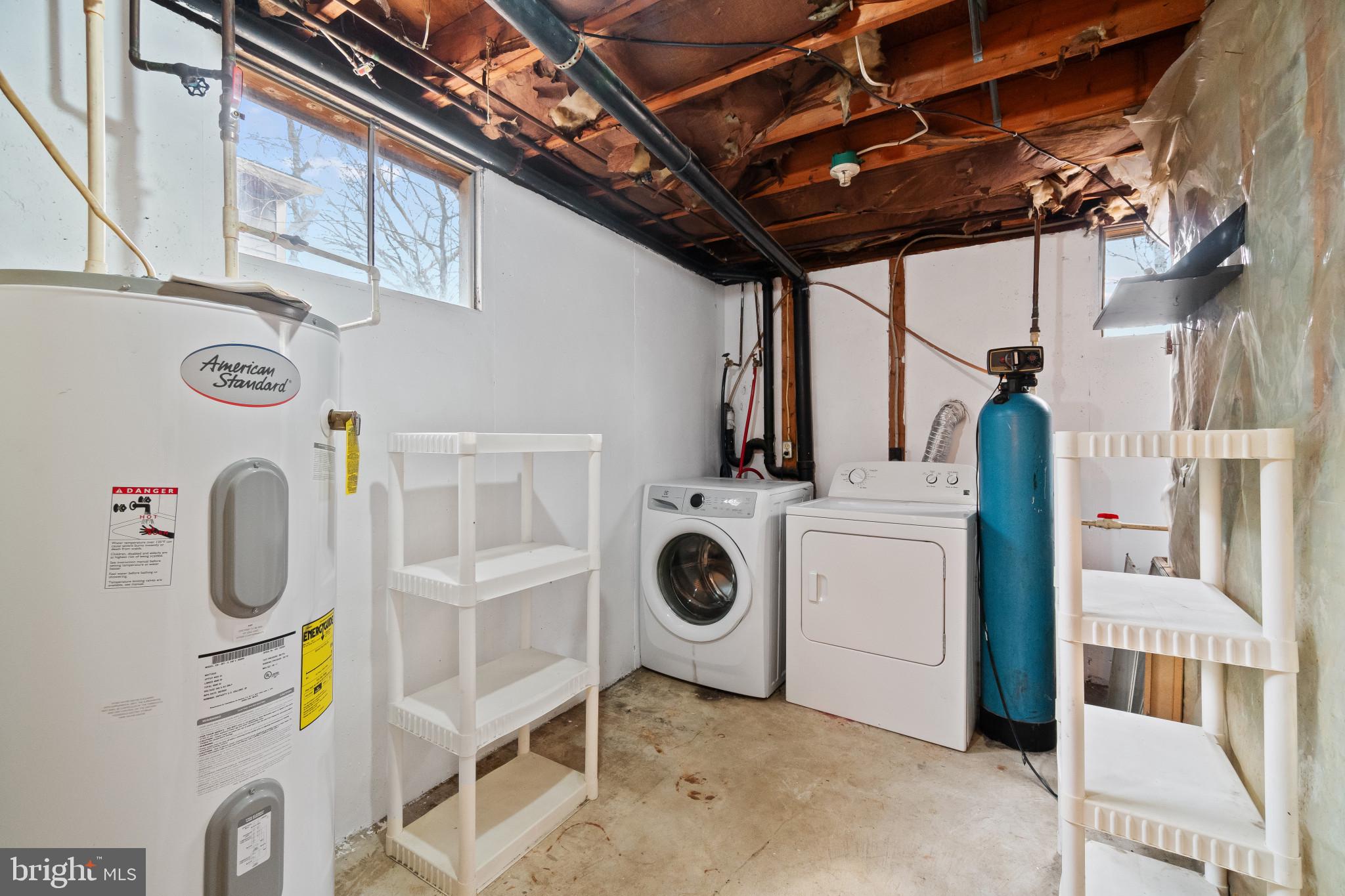 981 Westway Annapolis, MD 21409 - Photo 34 of 38 a utility room with dryer and washer