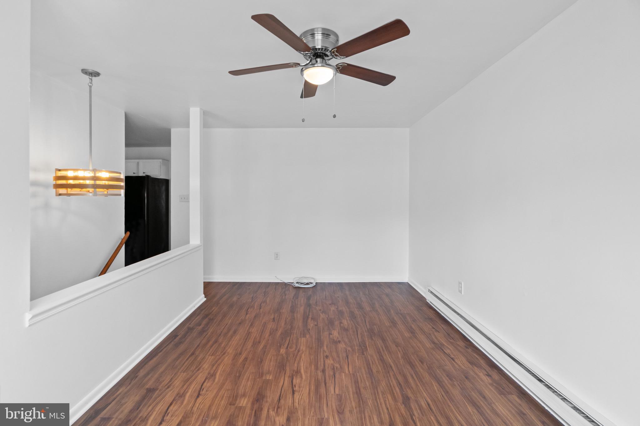 981 Westway Annapolis, MD 21409 - Photo 6 of 38 a view of an empty room with wooden floor