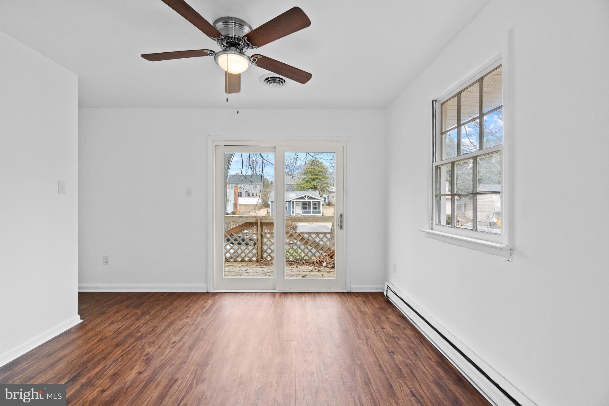 981 Westway Annapolis, MD 21409 - Photo 8 of 38 a view of an empty room with wooden floor and a window