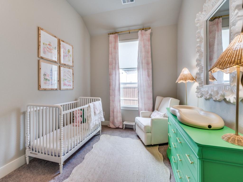 2724 Eccleston Street Celina, TX 75009 - Photo 19 of 29 a bedroom with a bed and a window