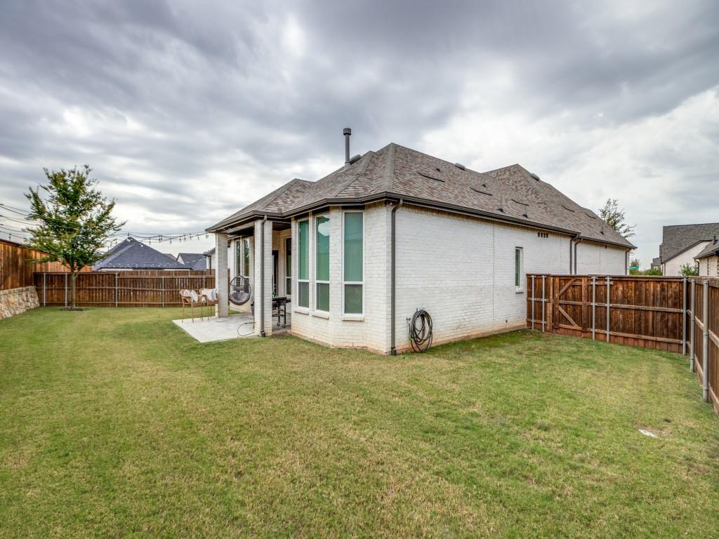 2724 Eccleston Street Celina, TX 75009 - Photo 26 of 29 a view of a house with backyard and garden