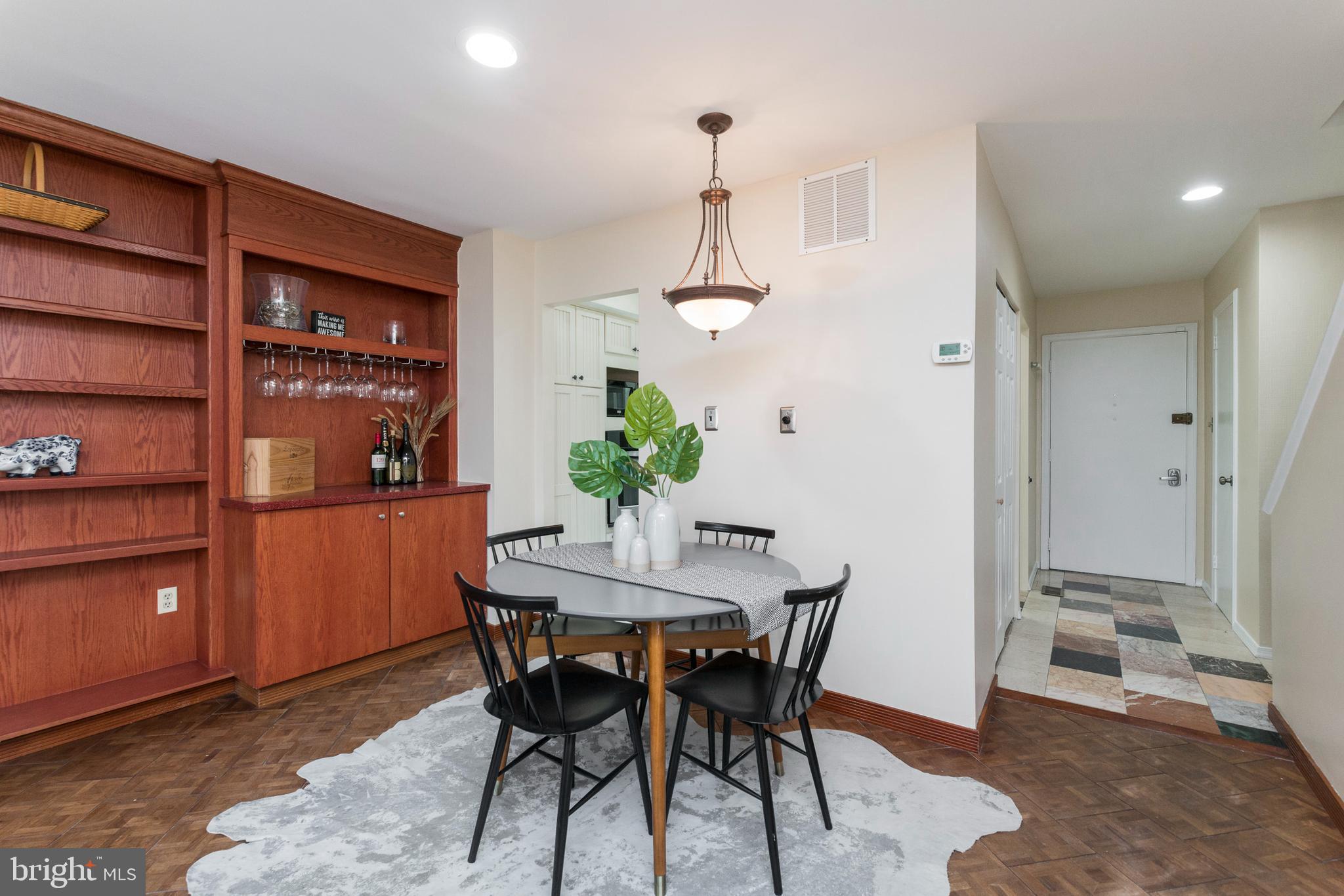 18 Stone Ridge Court, Unit 23 Baltimore, MD 21239 - Photo 6 of 19 a view of a dining room with furniture