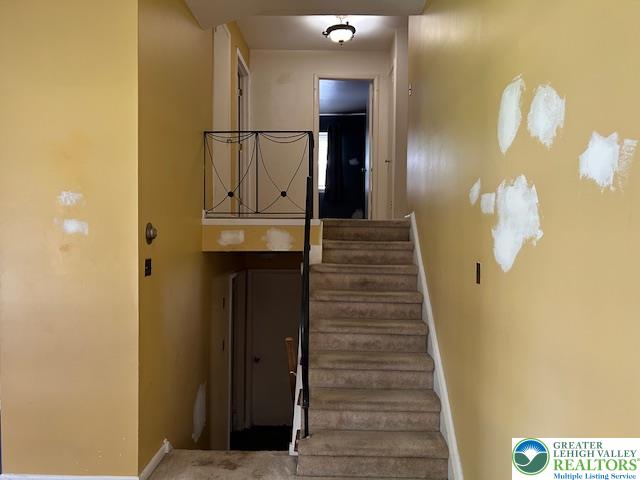 2065 Hopewell Road Bethlehem, PA 18017 - Photo 6 of 19 A well-lit interior staircase provides access to upper and lower levels.