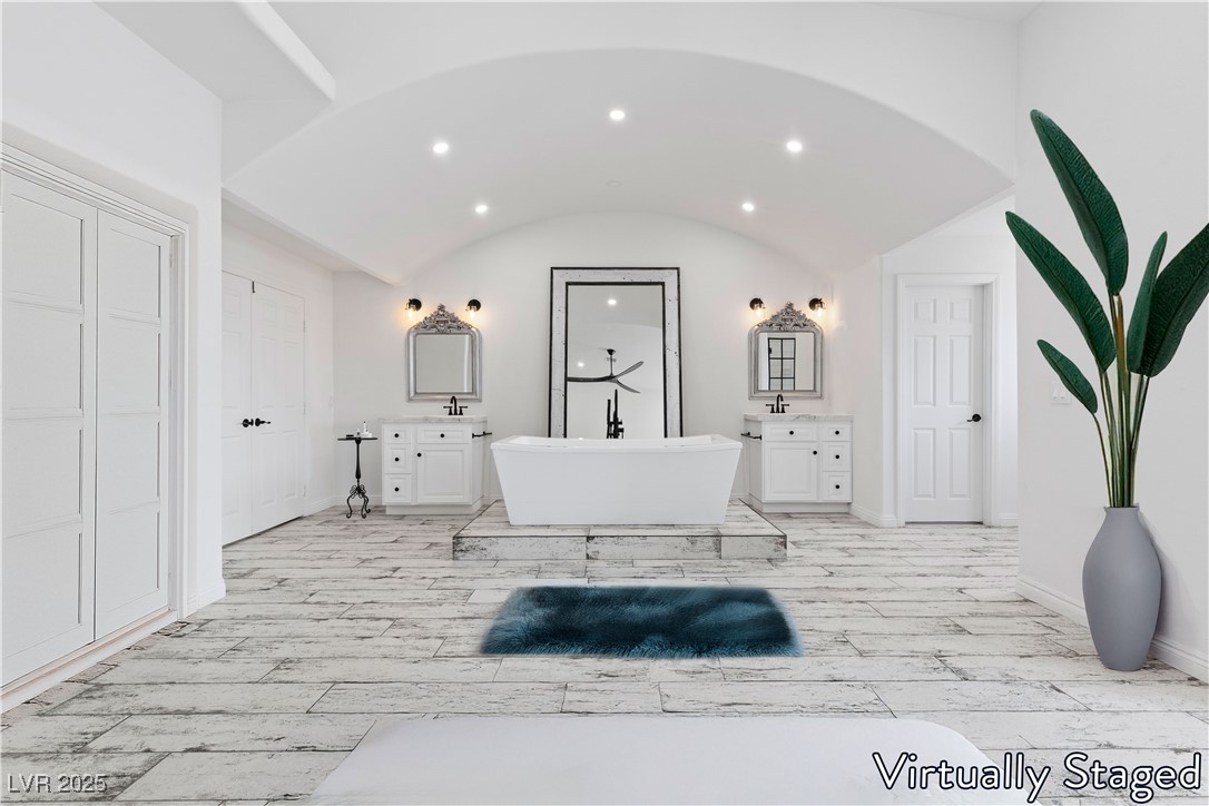 5555 West Desert Inn Road Las Vegas, NV 89146 - Photo 16 of 50 Virtually Staged- Gorgeous primary bedroom has a personalized layout that provides access to the primary ensuite!