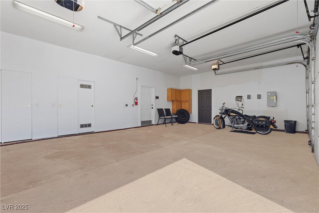 5555 West Desert Inn Road Las Vegas, NV 89146 - Photo 28 of 50 3-car garage includes a brand new water heater & state-of-the-art Oasis water softener system!