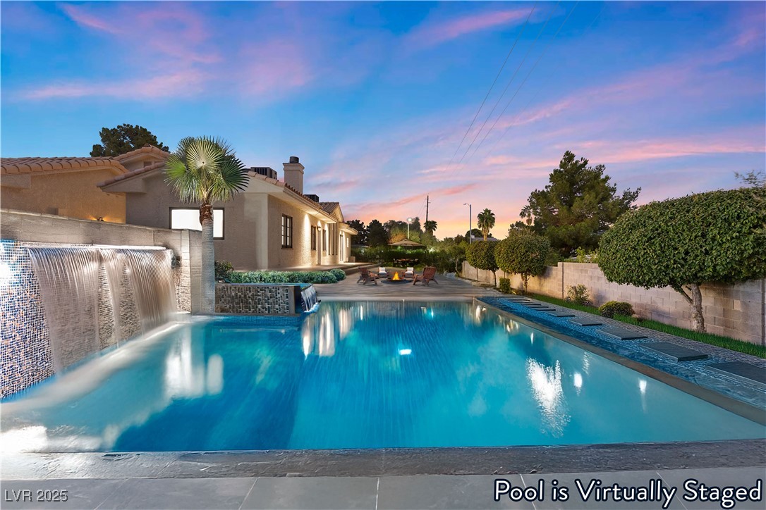 5555 West Desert Inn Road Las Vegas, NV 89146 - Photo 29 of 50 Virtually Staged- Incredible backyard space with RV parking and plenty of room for hosting and entertaining!