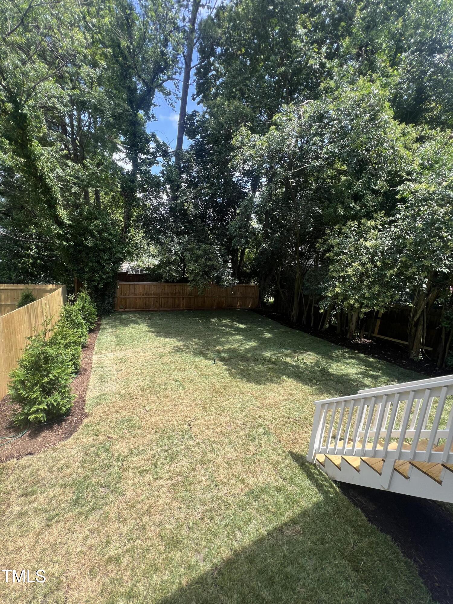 3302 Hall Place Raleigh, NC 27607 - Photo 3 of 25 a view of yard with large trees