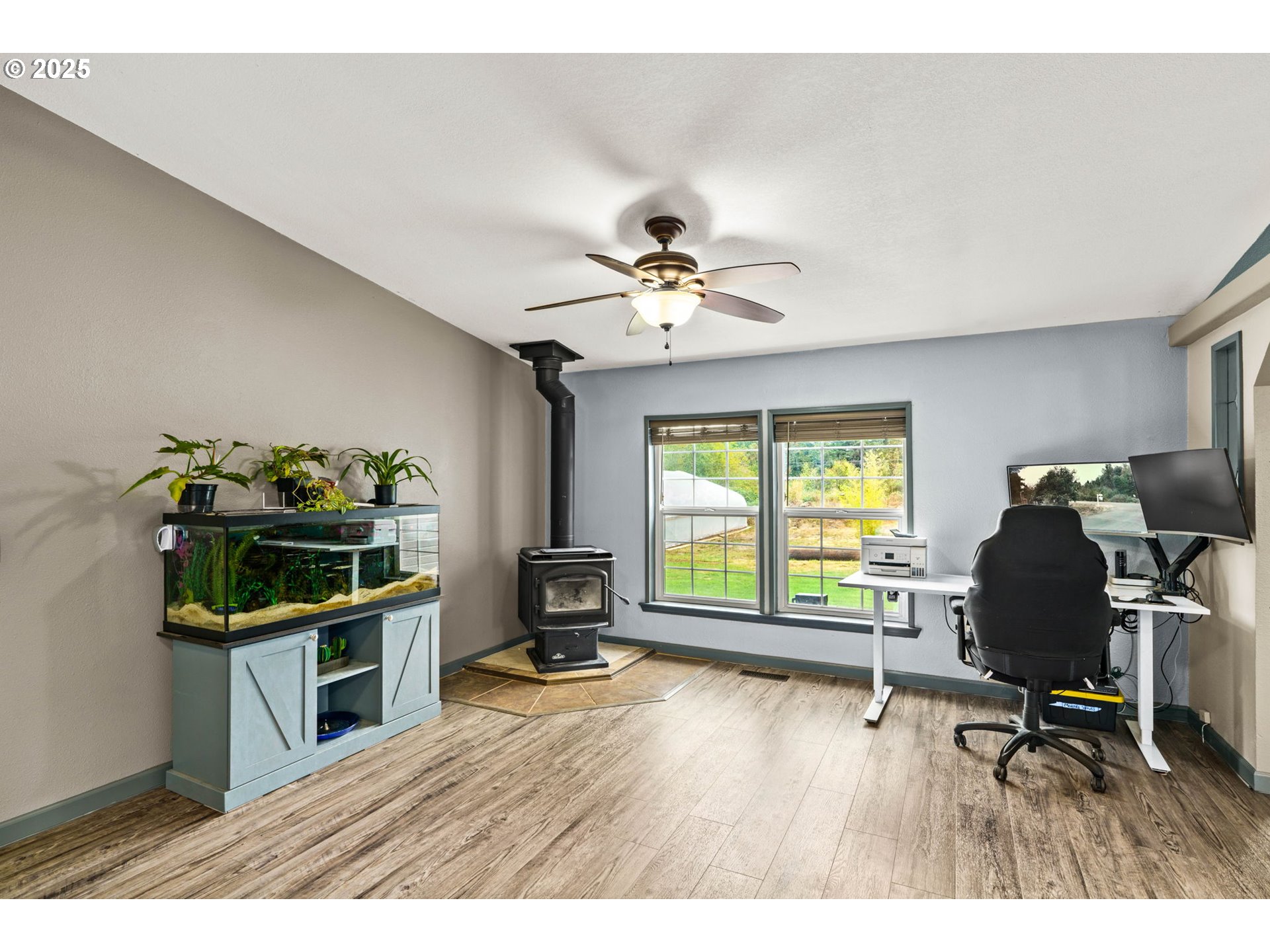 37495 Parsons Creek Road Springfield, OR 97478 - Photo 15 of 47 a workspace with furniture hardwood and a window