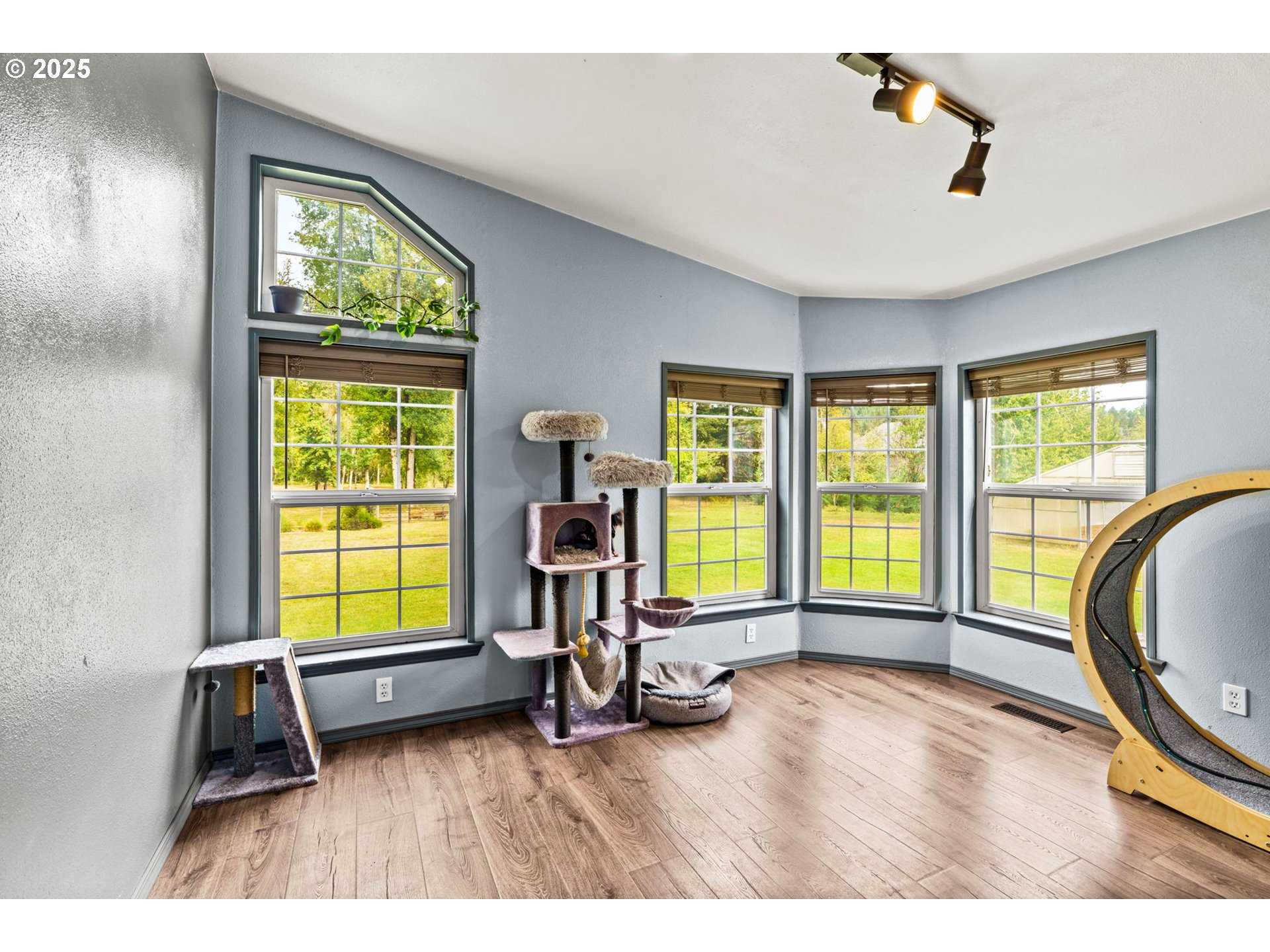 37495 Parsons Creek Road Springfield, OR 97478 - Photo 22 of 47 a view of a room with gym equipment and a large window