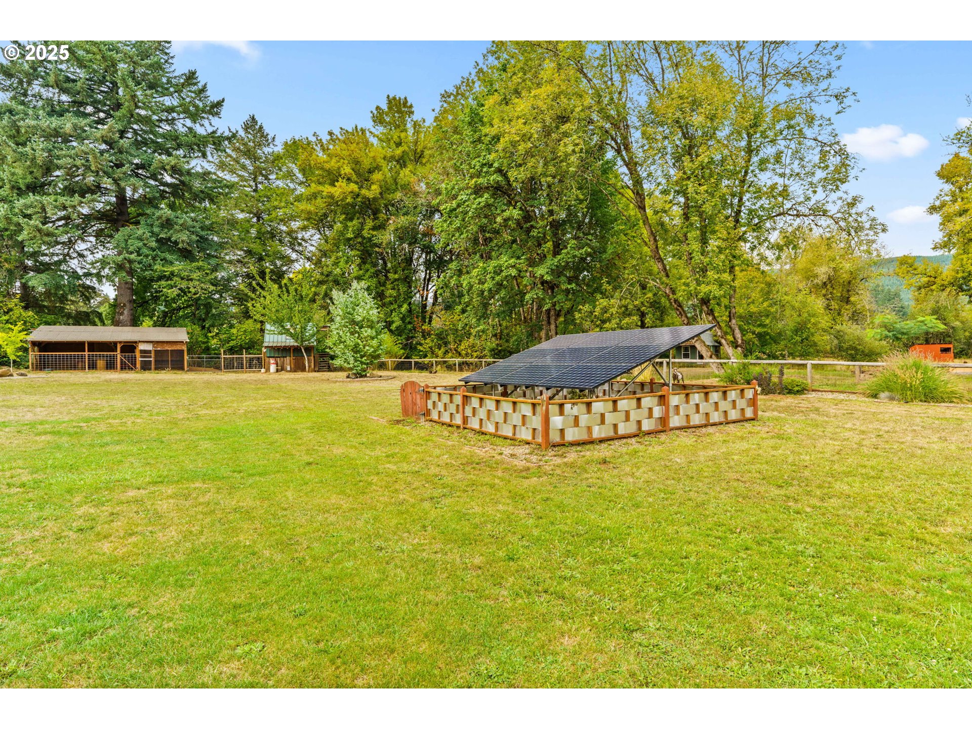 37495 Parsons Creek Road Springfield, OR 97478 - Photo 31 of 47 a view of a large yard with an outdoor space