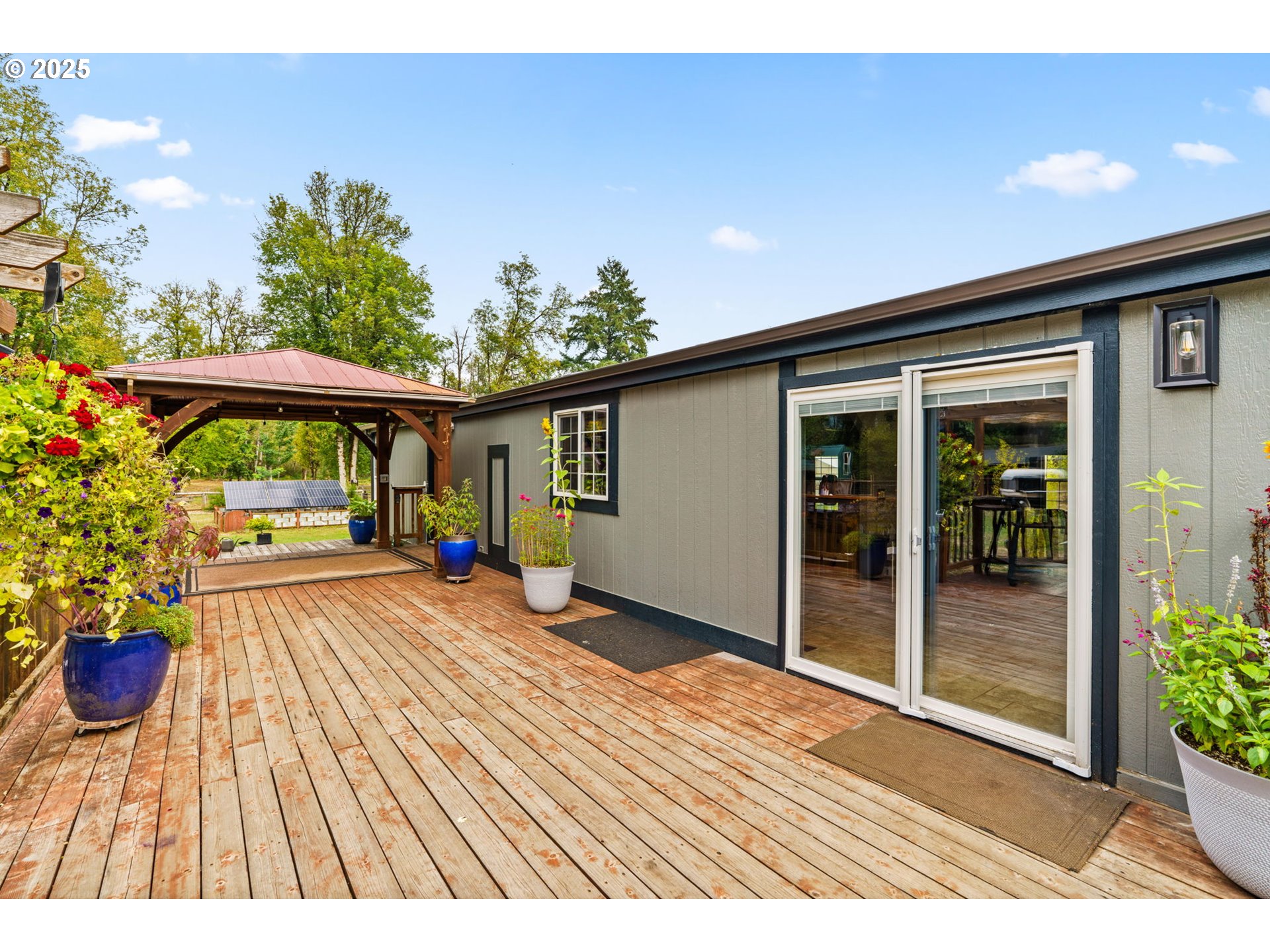 37495 Parsons Creek Road Springfield, OR 97478 - Photo 34 of 47 a view of a house with a patio