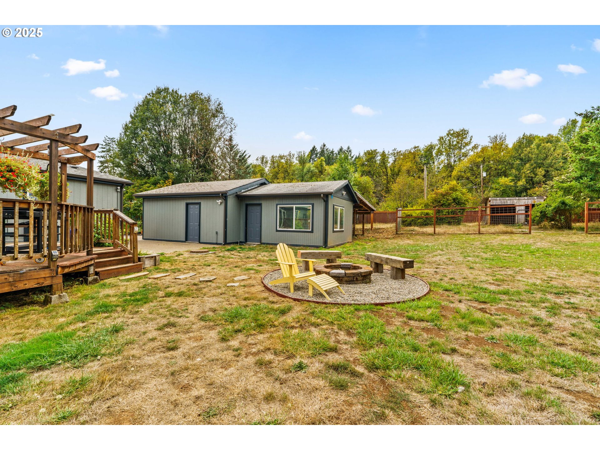 37495 Parsons Creek Road Springfield, OR 97478 - Photo 36 of 47 a view of a house with backyard and sitting area