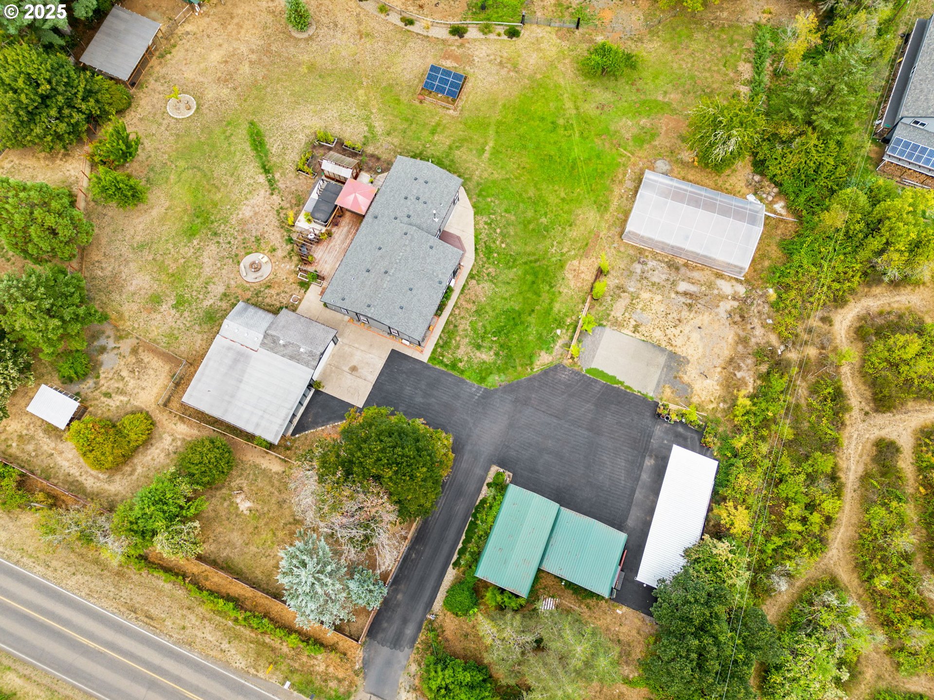 37495 Parsons Creek Road Springfield, OR 97478 - Photo 43 of 47 an aerial view of a house with outdoor space