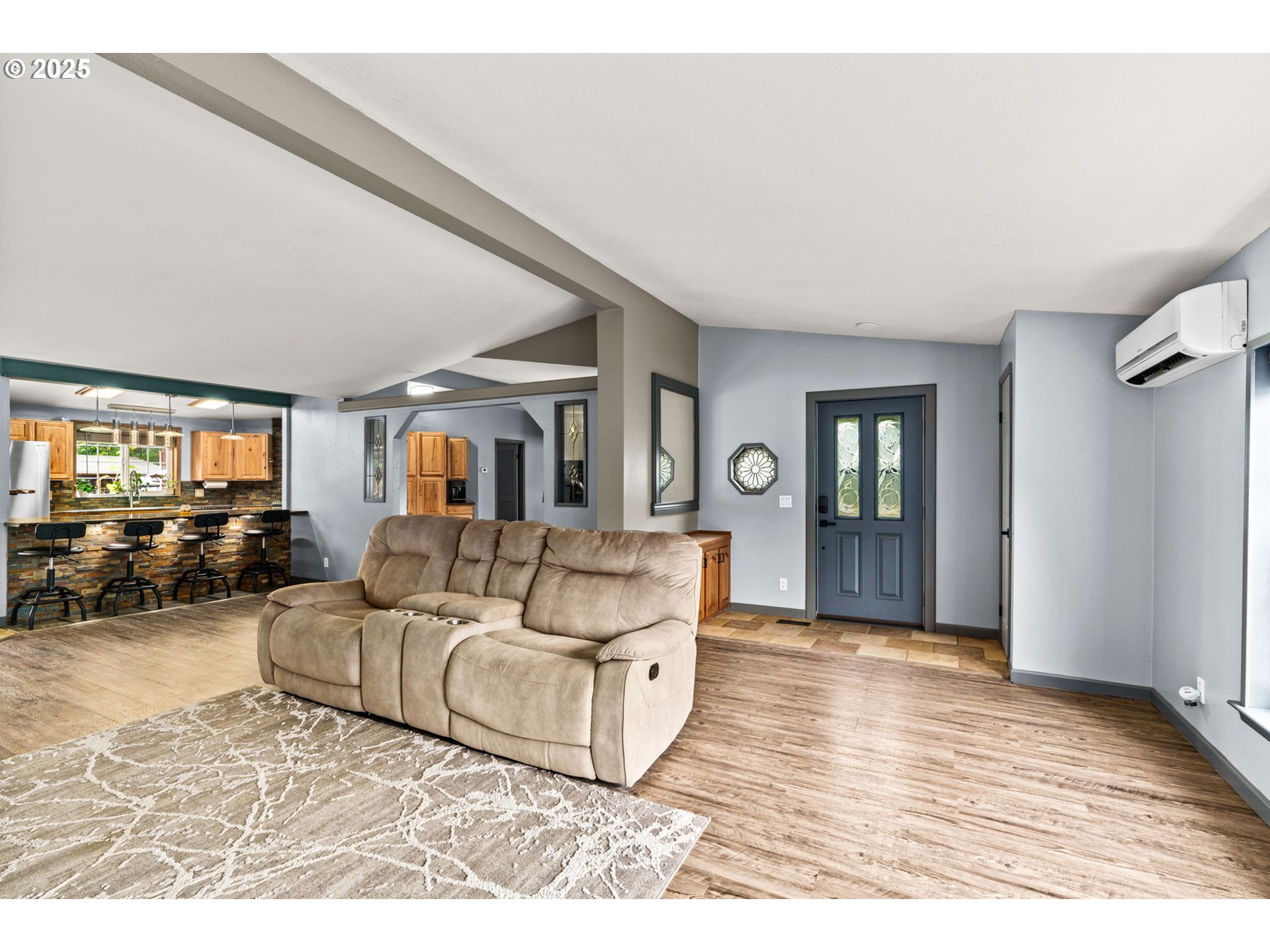 37495 Parsons Creek Road Springfield, OR 97478 - Photo 5 of 47 a living room with furniture and a wooden floor